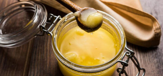 spoon of ghee from jar