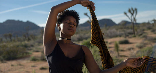 woman dancing in desert to let go