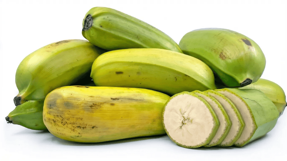 plantains whole and sliced showing green and yellow fruit naturally high in potassium for healthy diet and nutrition