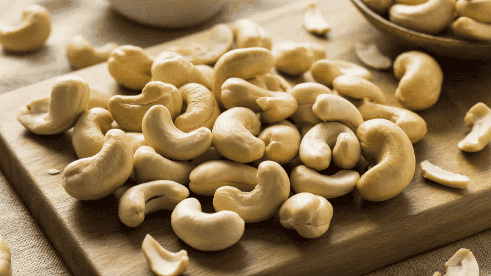 raw cashews on wooden board potassium rich nuts healthy snack ingredient for balanced diet and nutrition