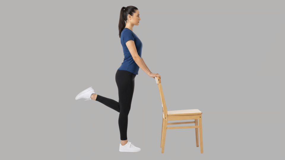 standing hamstring curls hold a chair