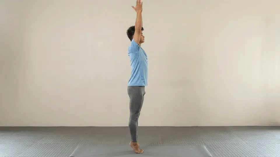 mountain pose tadasana standing tall with feet grounded arms relaxed and spine aligned for stable posture and balance practice