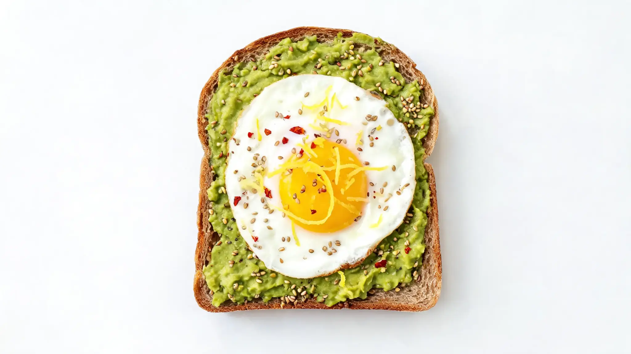 avocado toast with egg and hemp seeds on whole grain bread