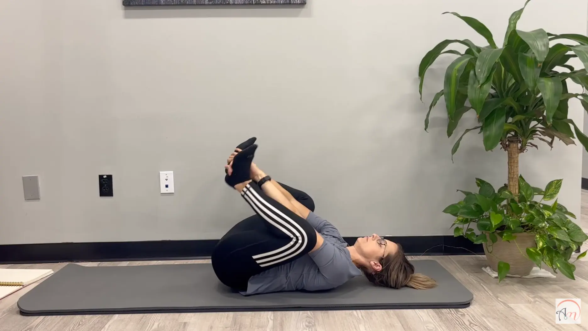 hands holding foot arches