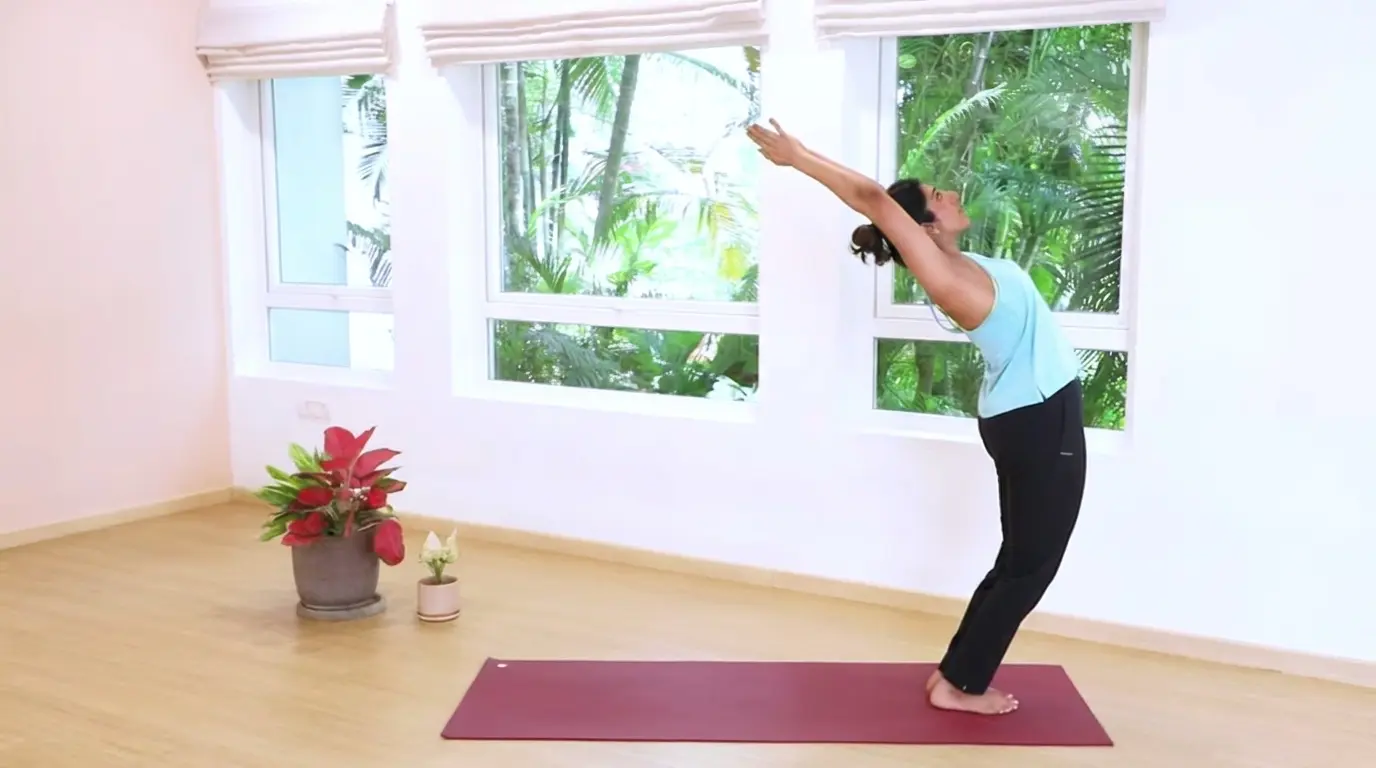 hasta uttanasana raised arms pose with arms lifted overhead and chest opening gently