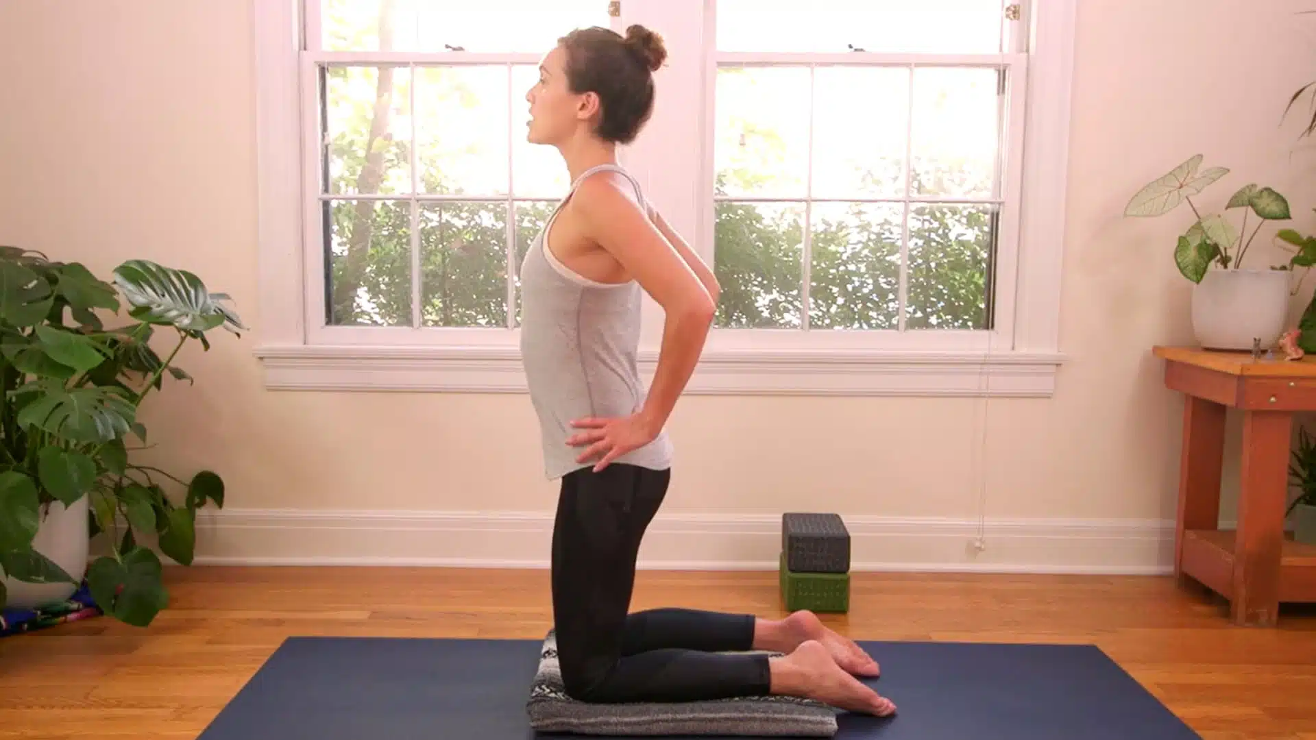 Kneeling setup position for camel pose yoga