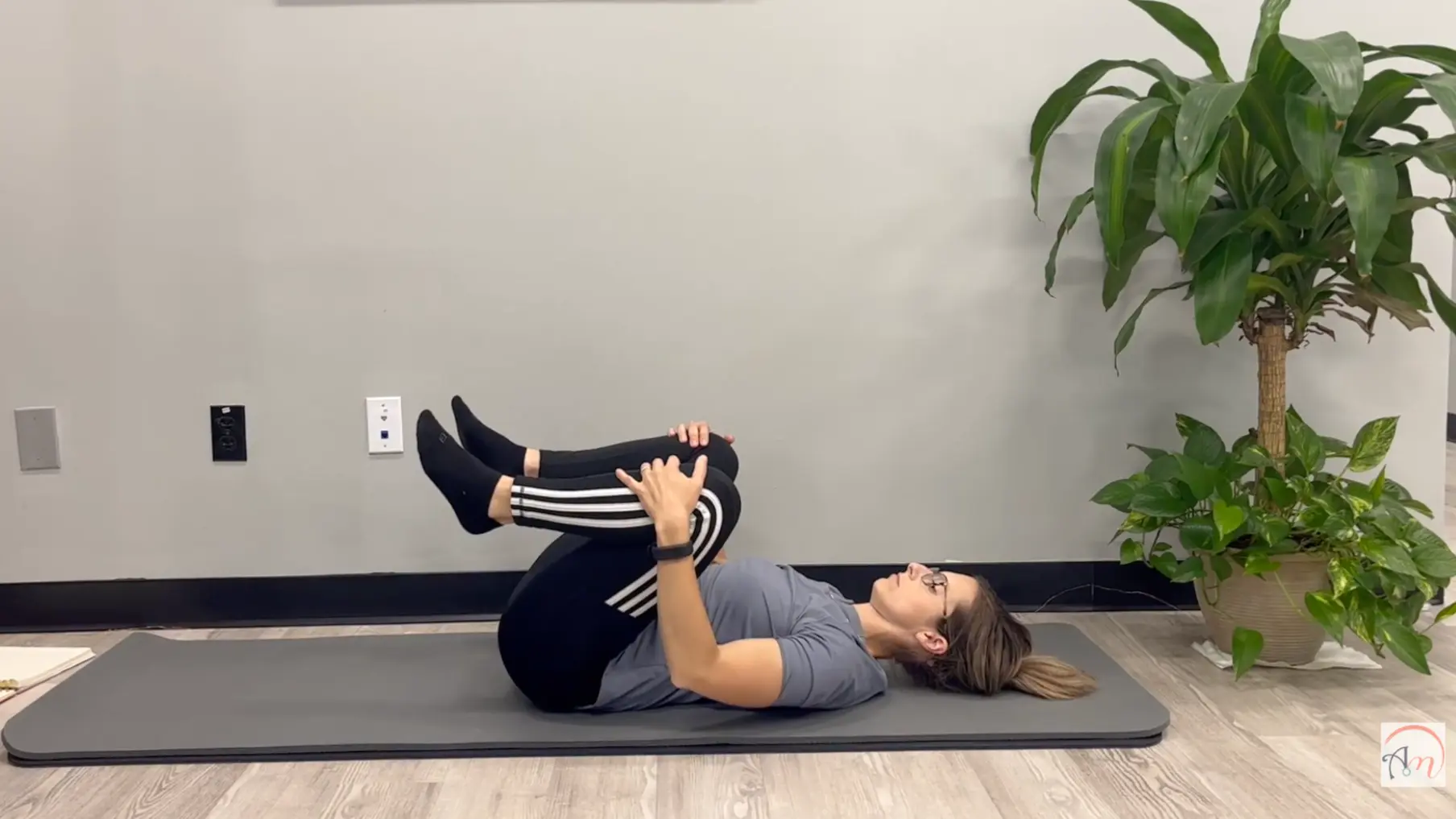 knees drawn toward chest (1)