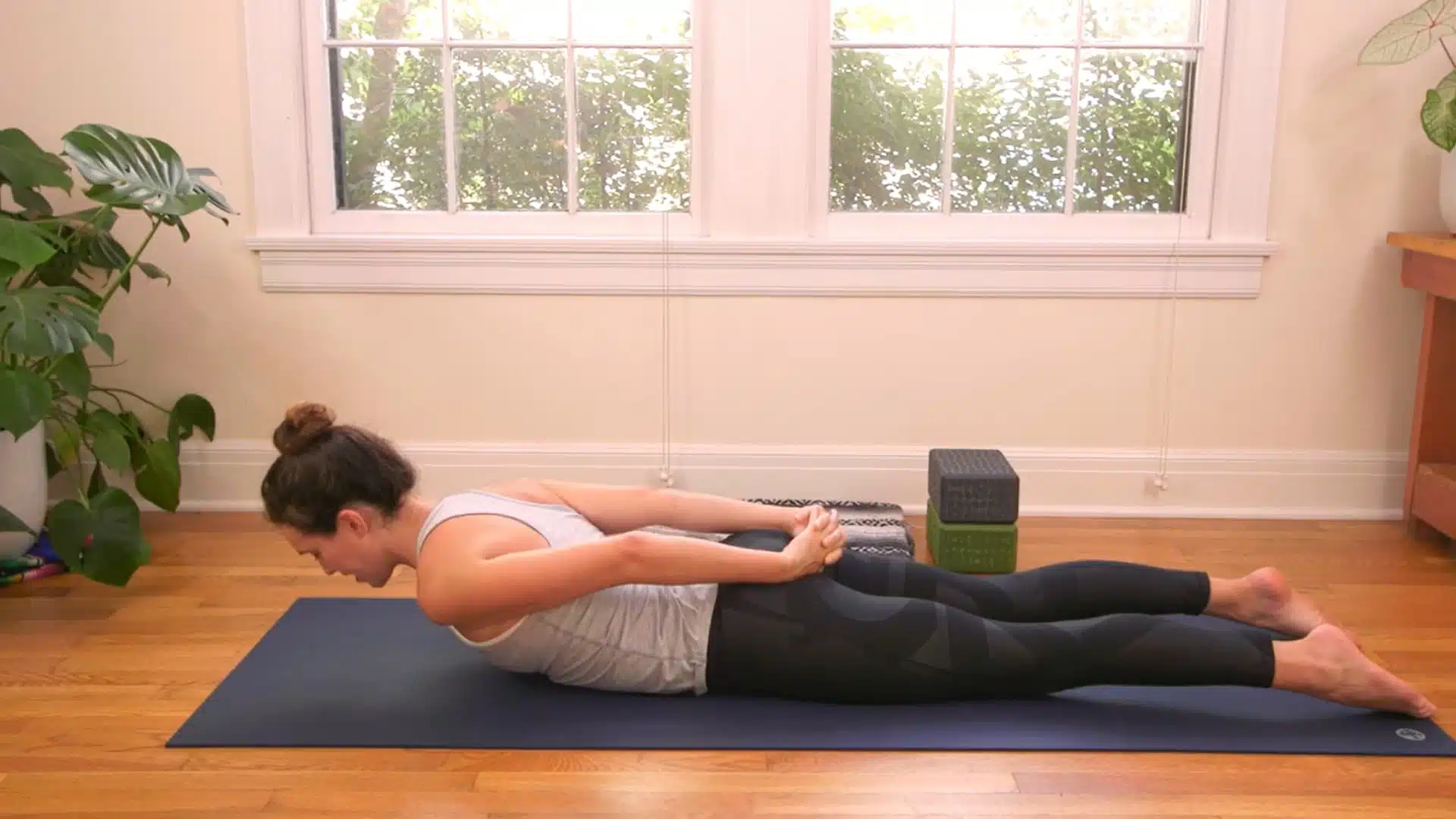 Locust pose strengthening the back for camel pose