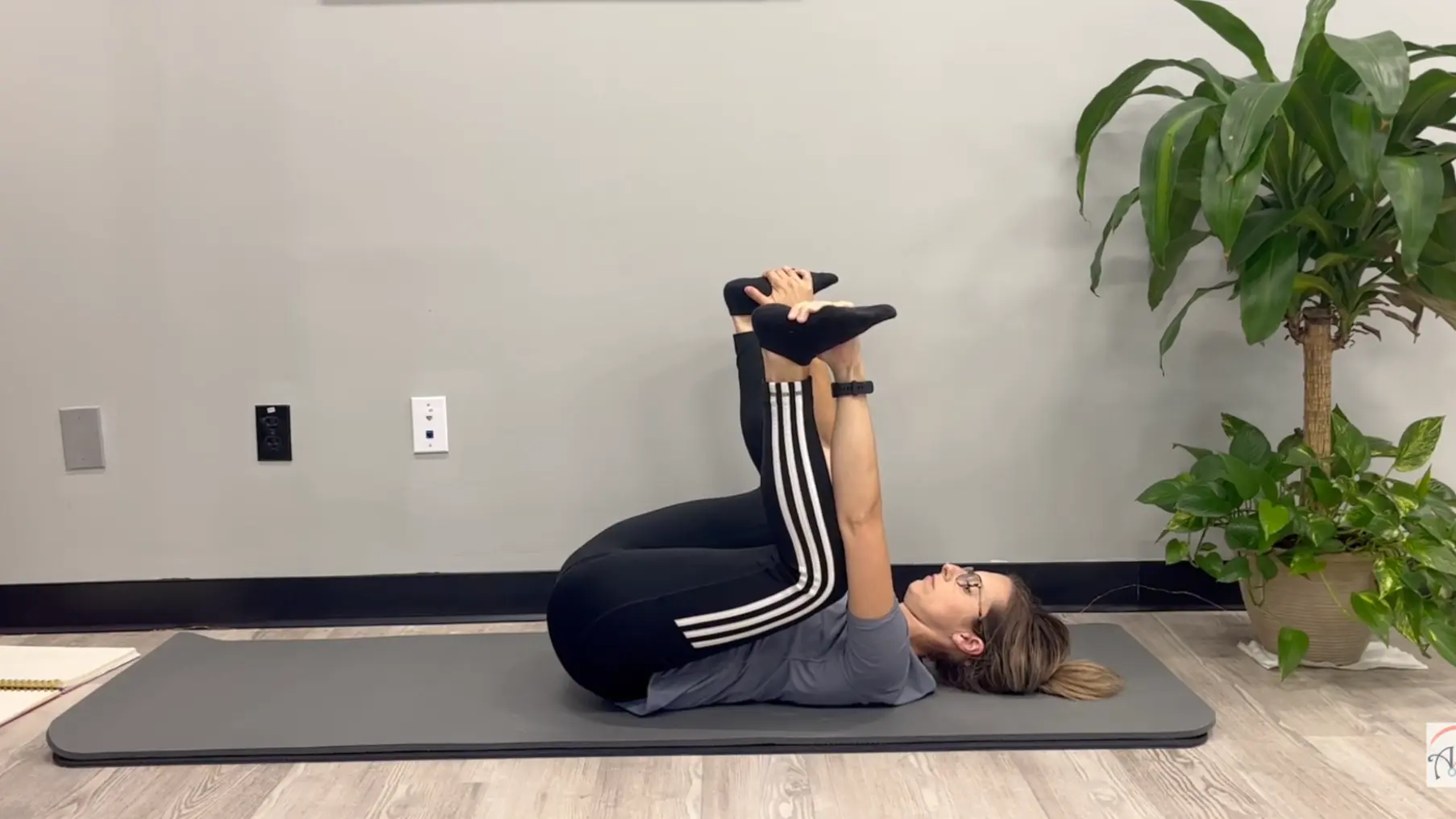 relaxed happy baby pose position