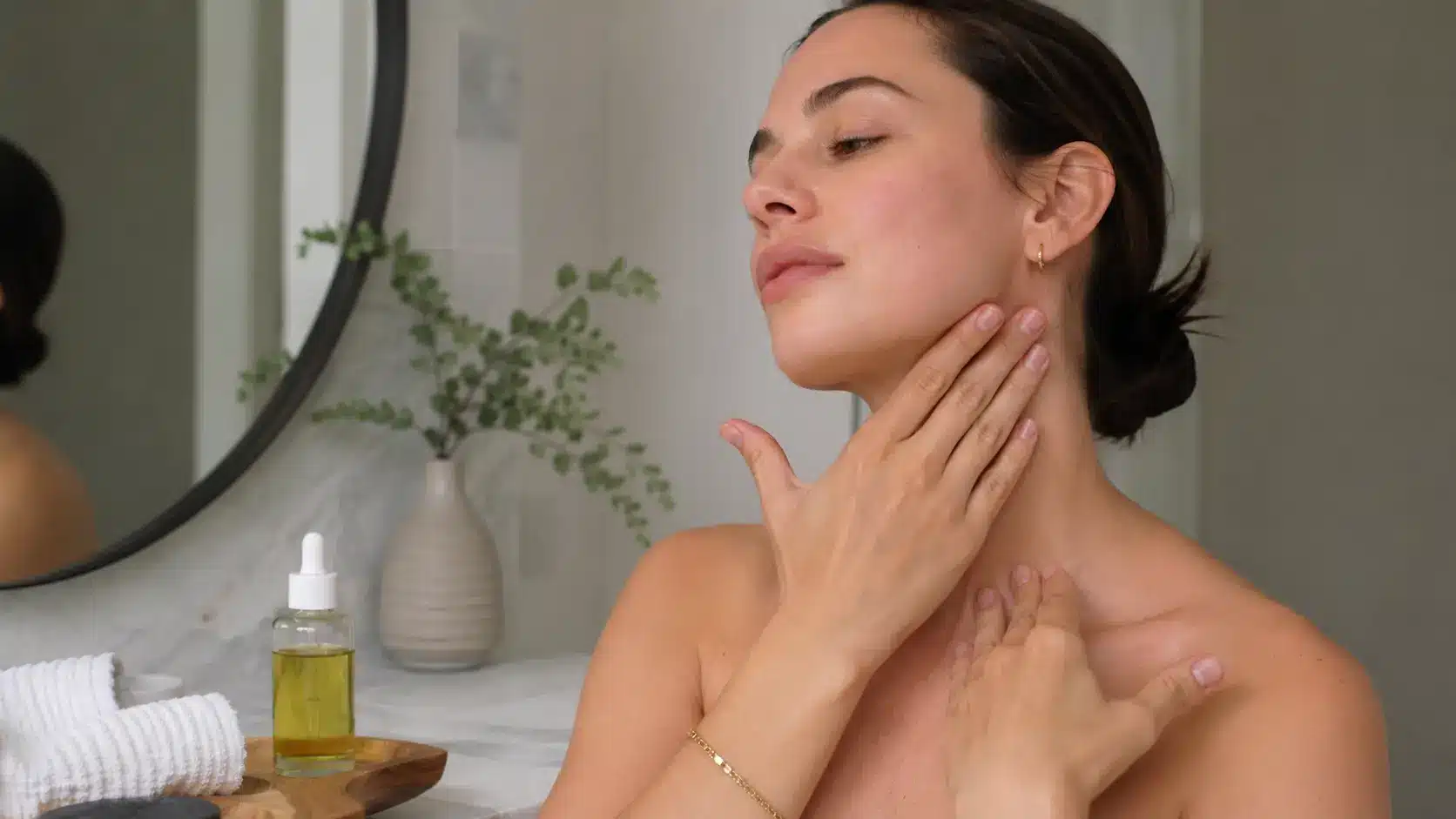 woman doing facial lymphatic drainage massage, lymphatic drainage massage face at home
